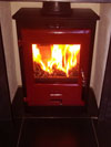 OER 5kW wood burner with red enamel at Hove Wood Burners