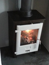 OER 5kW defra approved stove with gret enamel door fitted in Brighton